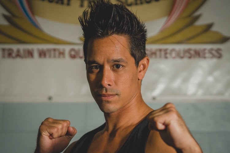 Kru Dan Mayid in a Muay Thai stance
